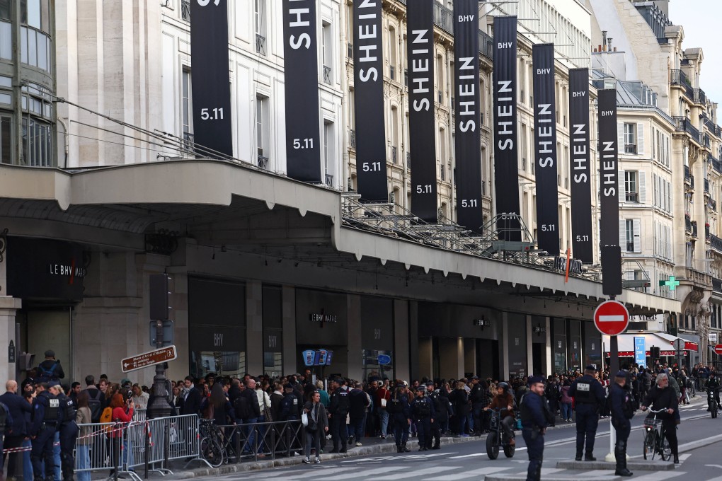 Shein signs hang above a department store in central Paris. Photo: Reuters
