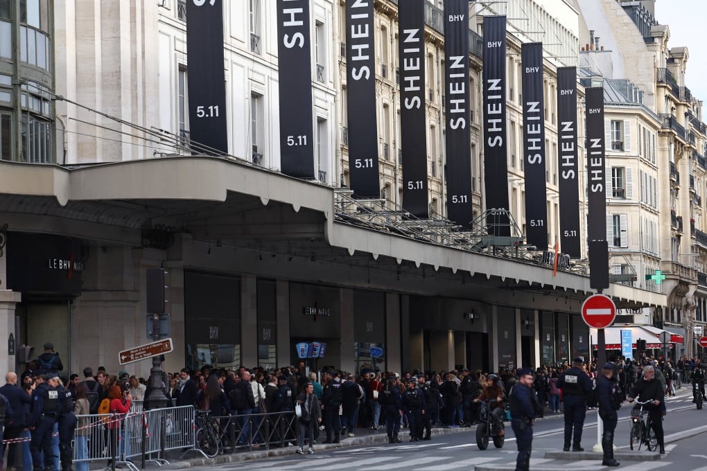 Shein signs hang above a department store in central Paris. Photo: Reuters