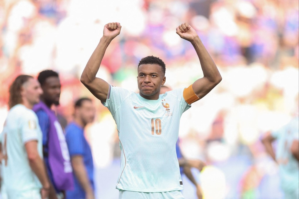 Kylian Mbappe salutes supporters following France’s comfortable quarter-final victory over Morocco. Photo: AFP