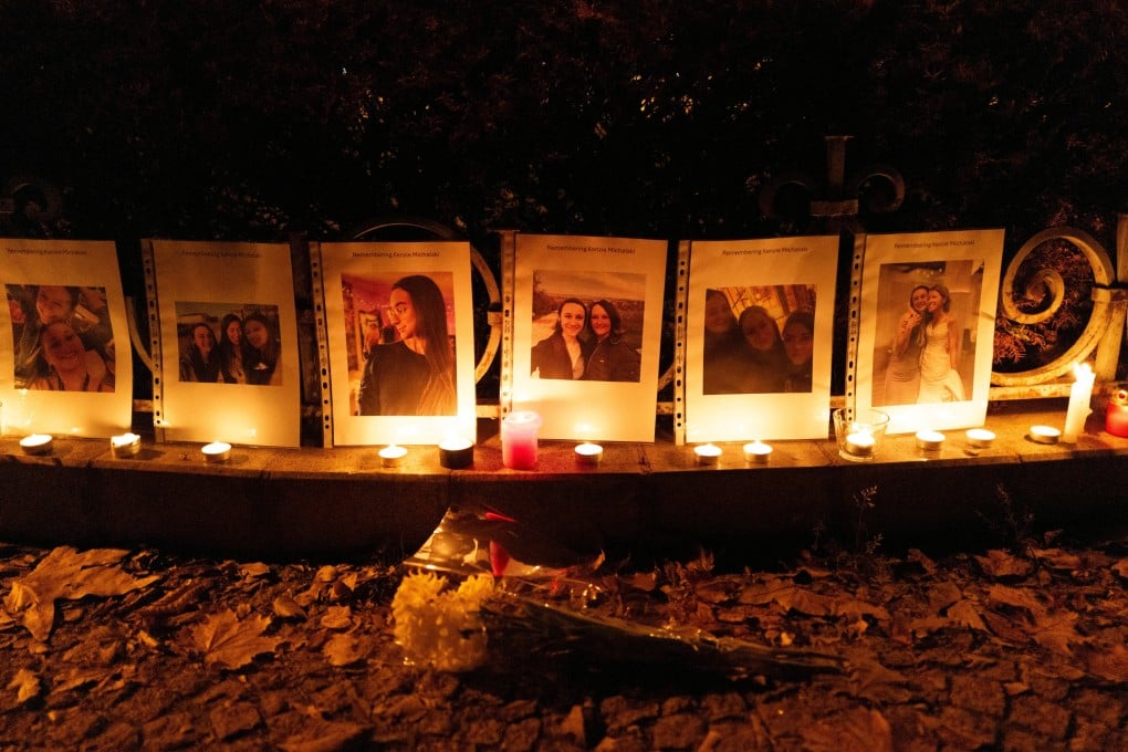 Photos showing Mackenzie Michalski, a 31-year-old American tourist who was murdered while on vacation, hang at a candlelight vigil in Budapest, Hungary in 2024. Photo: AP
