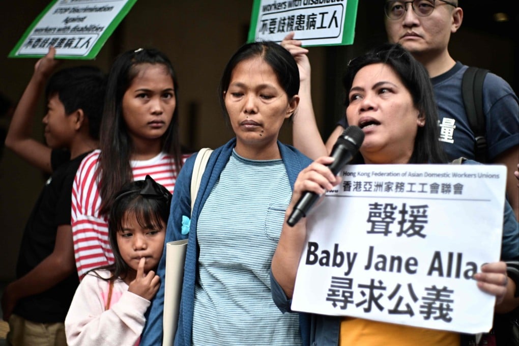 Baby Jane Allas (centre) after a hearing at the Labour Tribunal in Hong Kong on April 15, 2019. A Hong Kong court has awarded more than HK$251,000 to the family of Allas, who was dismissed by her employer in 2019 after being diagnosed with advanced cervical cancer and who later died. Photo: AFP