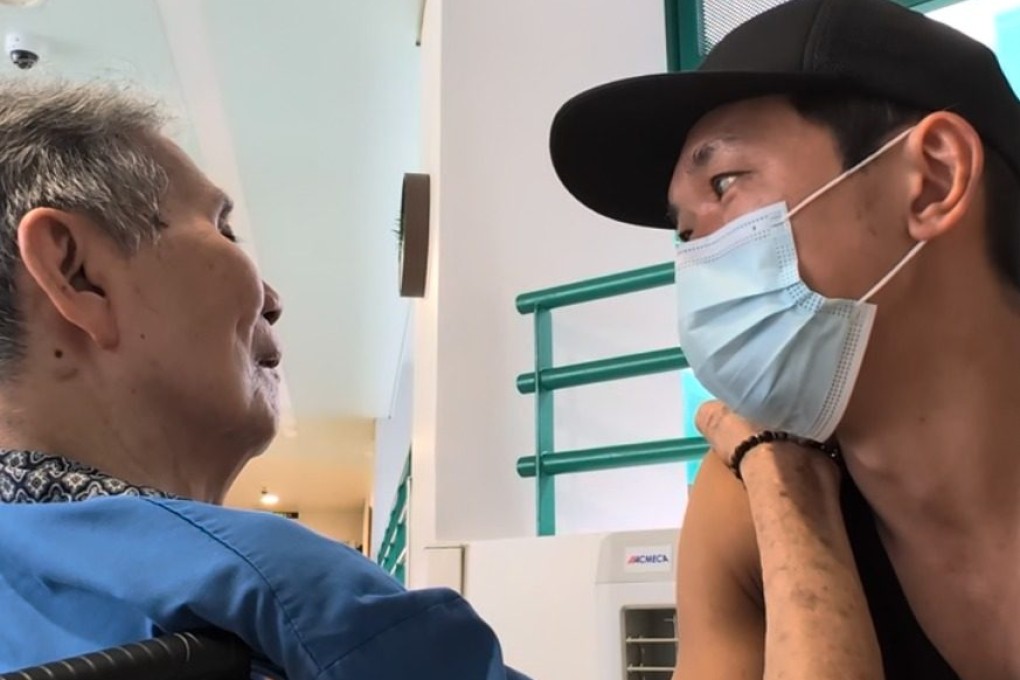 Content creator Edgar Tang speaks to his father in a nursing home. Photo: Handout