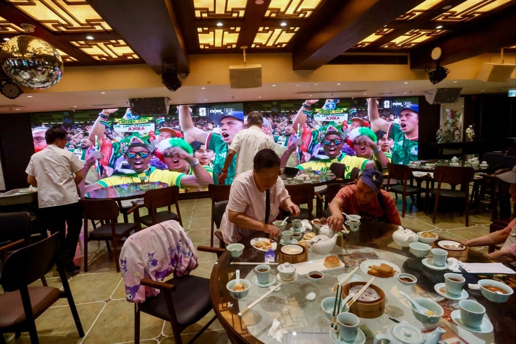People watching the live broadcast of a Fifa World Cup 2026 football match at Lin Heung Lau in Sheung Wan in June. Photo: Jonathan Wong