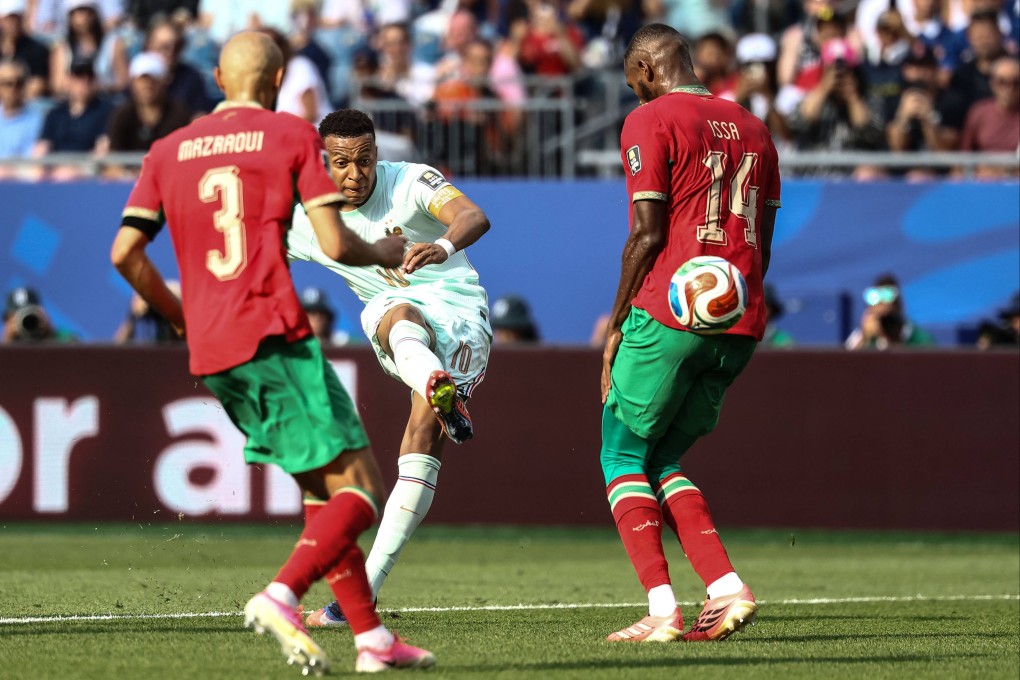 Kylian Mbappe scores France's first goal in their quarter-final 2-0 win over Morocco at Gillette Stadium in Foxborough on Thursday. Photo: AFP