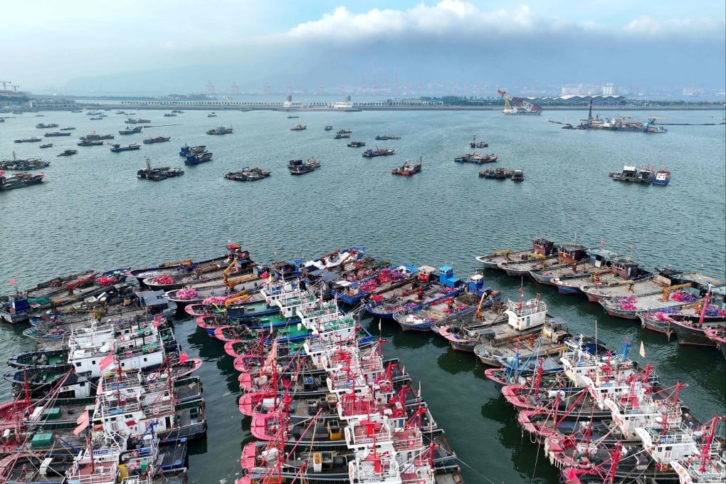 Fishing boats in east China’s Jiangsu province are moored on Friday in preparation for Typhoon Bavi, which is predicted to hit the region this weekend. Photo: AFP