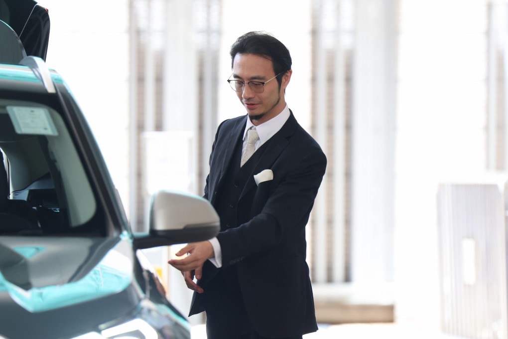 Franco Kuan leaves West Kowloon Court after an unrelated hearing on Friday. He appeared at Sha Tin Court earlier in the day to face charges of dangerous driving and driving under the influence of alcohol. Photo: Brian Wong