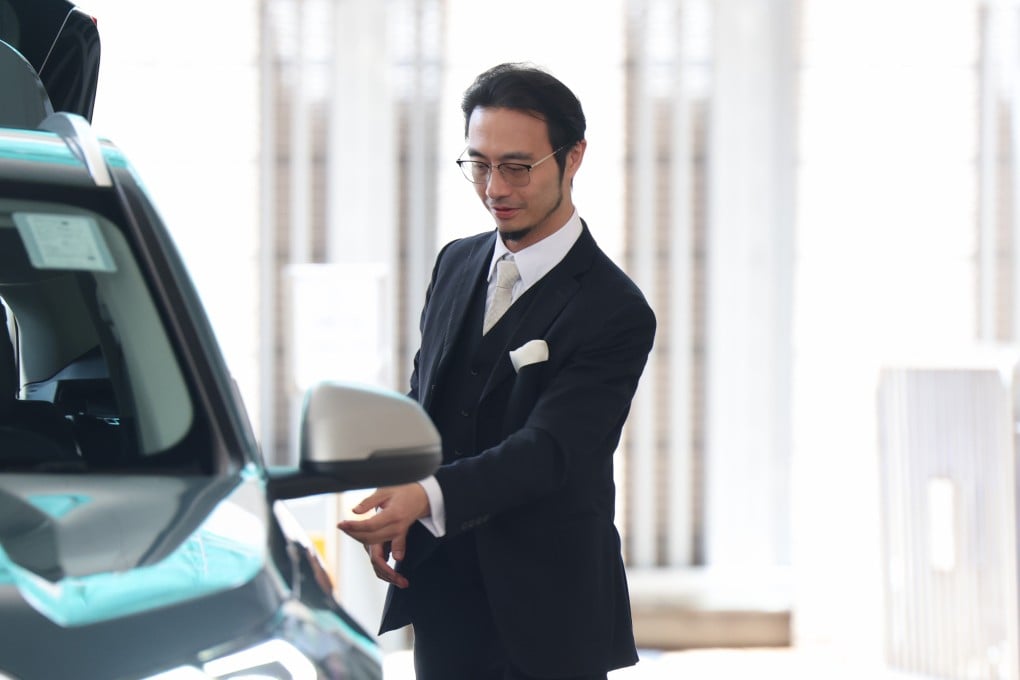 Franco Kuan leaves West Kowloon Court after an unrelated hearing on Friday. He appeared at Sha Tin Court earlier in the day to face charges of dangerous driving and driving under the influence of alcohol. Photo: Brian Wong