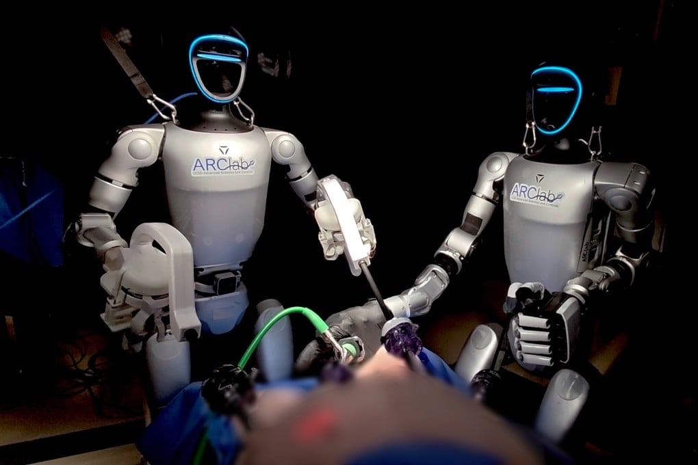 The robots operate on a pig to remove its gallbladder. Photo: Handout