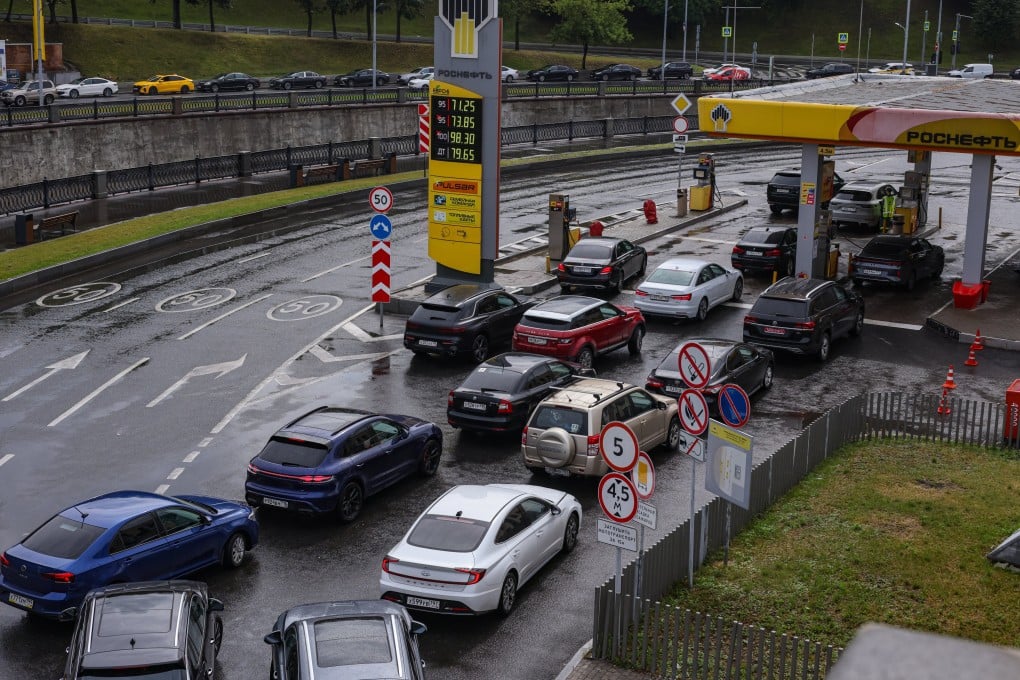 Cars line up at a fuel station in Moscow, Russia, on Thursday. Photo: EPA