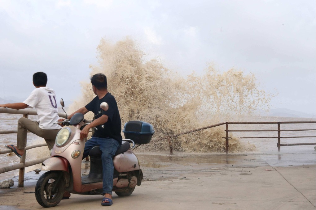 Large waves crash against the coast in Wenling city, Zhejiang province ,as Typhoon Bavi approaches the east coast of China. Photo: AFP