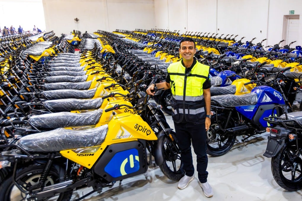 Gagan Gupta, the founder of Spiro, Africa’s largest electric two-wheeler provider, stands in a packed warehouse. Photo: Handout
