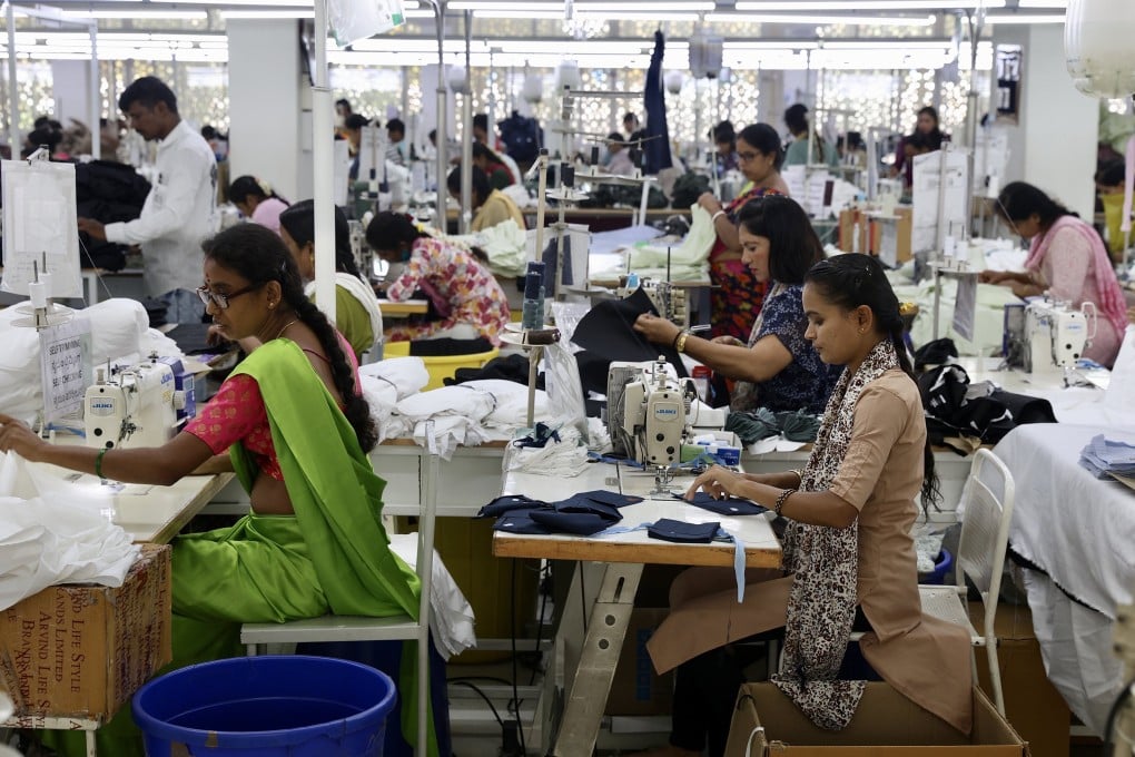 Employees work at a garment factory in Bengaluru, India, in May. Indian textiles and leather products are expected to gain from the country’s trade deal with the UK. Photo: EPA