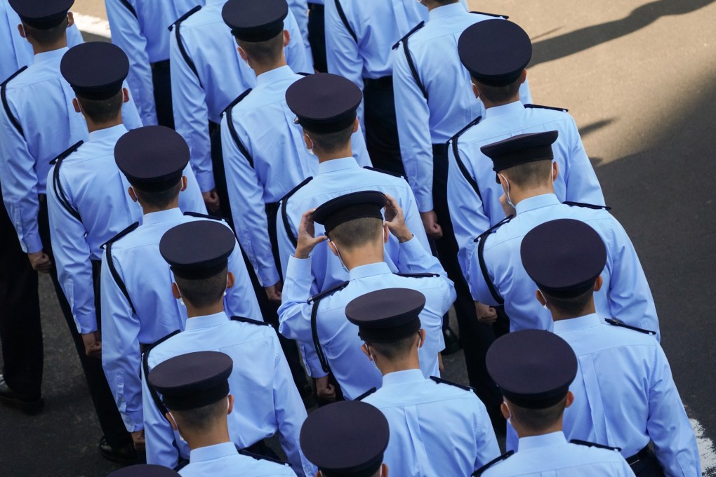 Police officers take part in a parade.  The Junior Police Officers’ Association has said the new appraisal system is unfair. Photo: Felix Wong