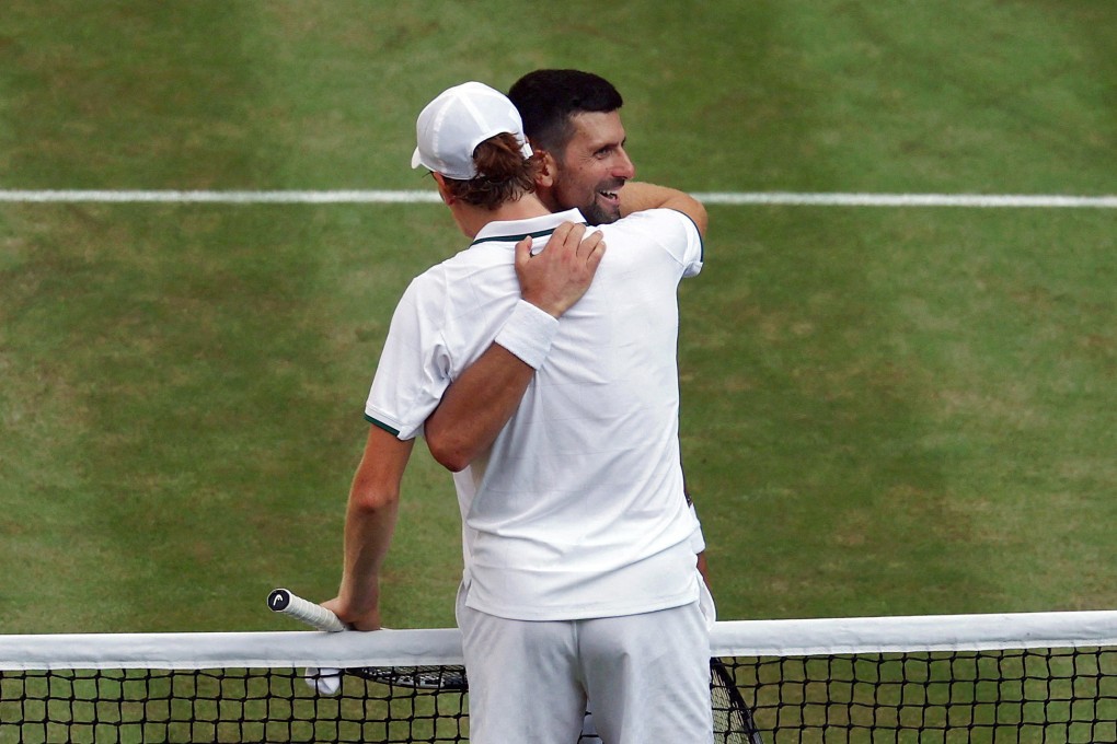 Jannik Sinner and Novak Djokovic share a hug after the Italian’s Wimbledon semi-final victory. Photo: Reuters