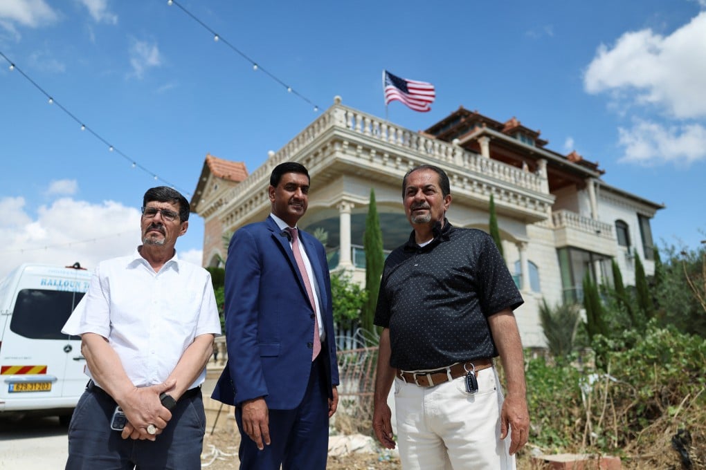 US Representative Ro Khanna (D-CA) stands next to Palestinian residents of Turmus Ayya, near Ramallah, during a visit in the Israeli-occupied West Bank, on Thursday. Photo: Reuters