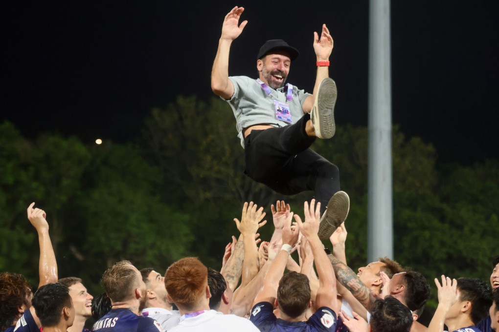 Inigo Calderon is tossed in the air by his players after Kitchee wrapped up the league title last season. Photo: Jonathan Wong