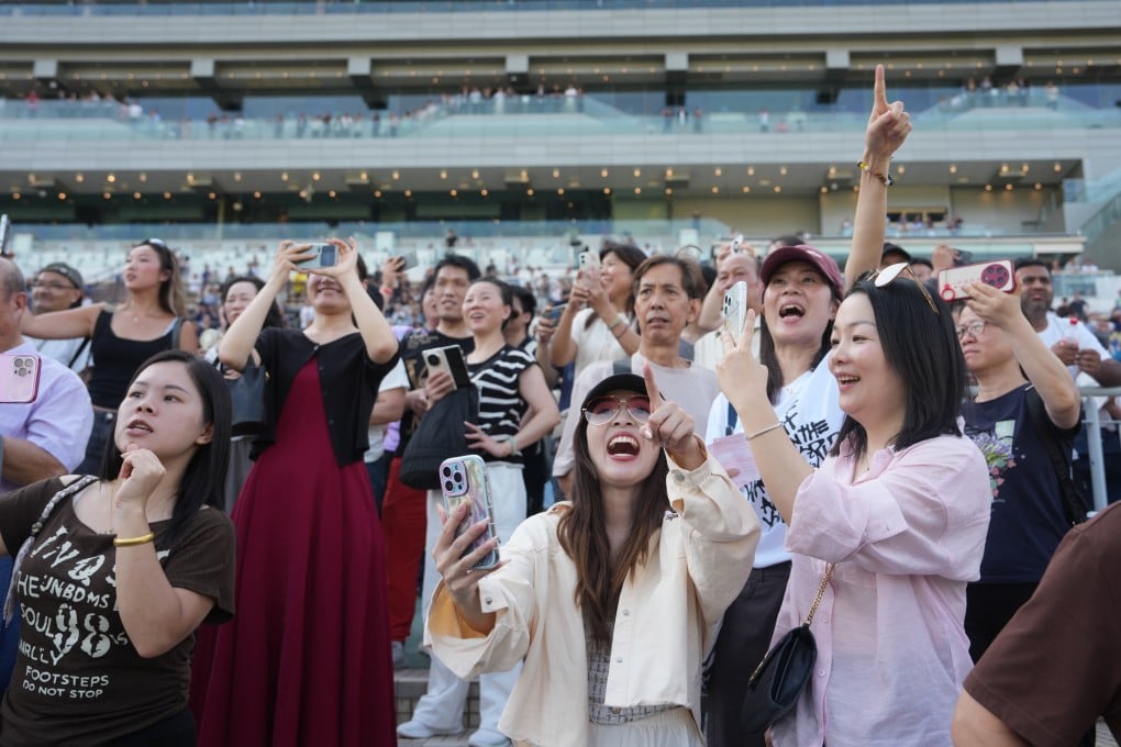 Racing fans cheer on their favourites at Sha Tin during the penultimate meet of the Hong Kong season. Photo: Sam Tsang