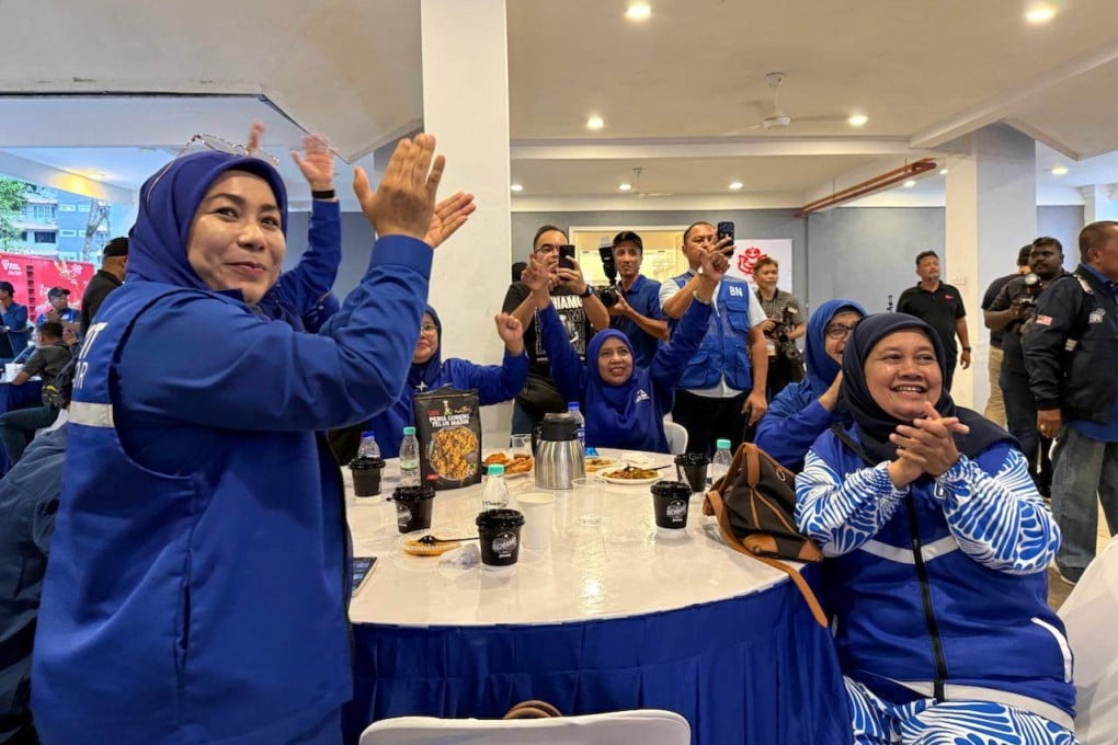 Barisan Nasional supporters celebrate at the coalition’s Johor Bahru command centre during Saturday’s election. Photo: Iman Muttaqin Yusof