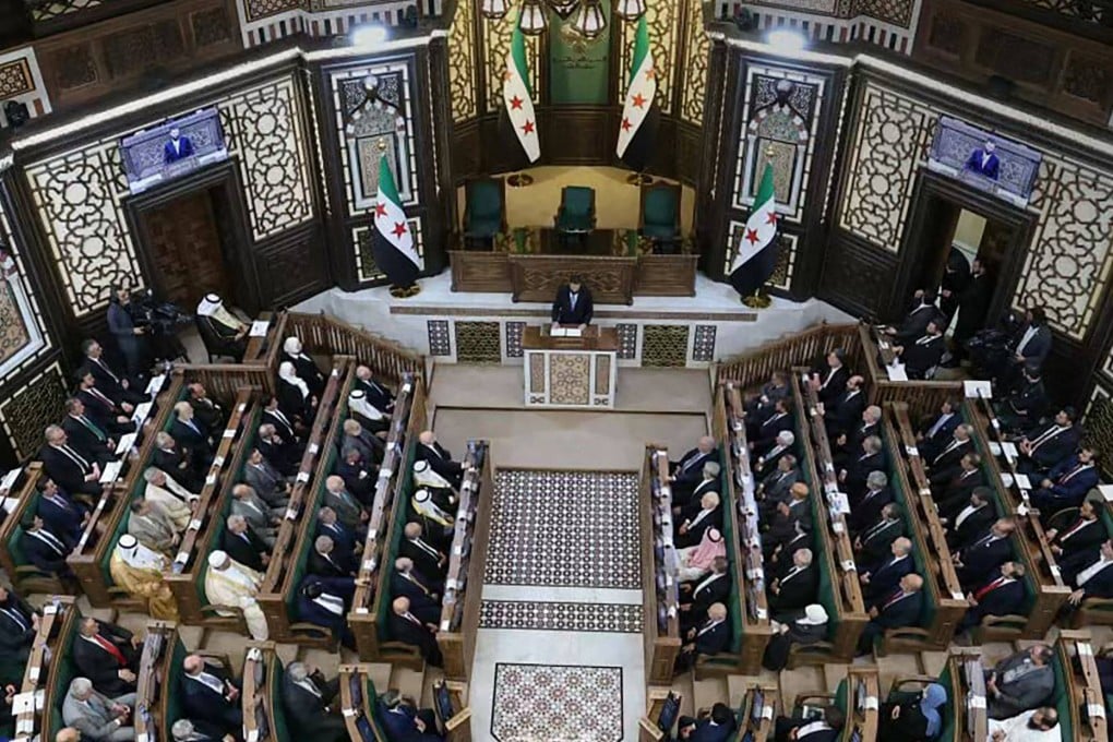 Syria’s President Ahmed al-Sharaa addresses the first meeting of Syria’s new transitional parliament in Damascus on Sunday. Photo: AFP
