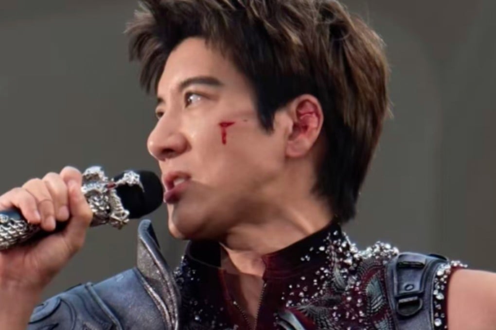Taiwanese-American singer Leehom Wang was rushed for medical treatment after a shocking on-stage trip over a safety harness left him with 39 facial stitches during a concert in China. Photo: Weibo