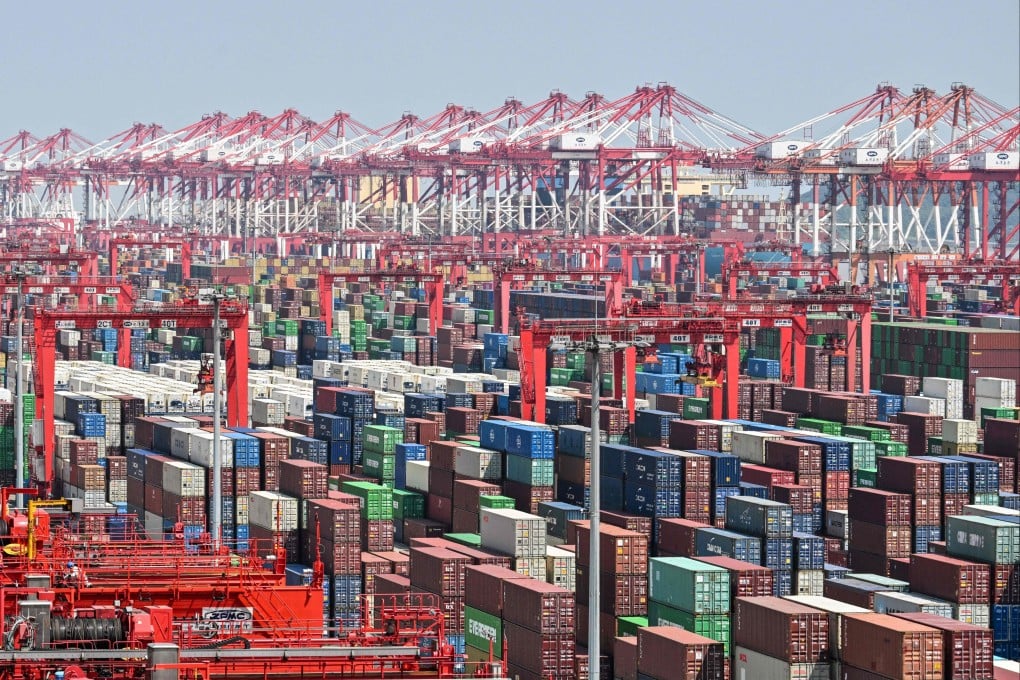 A general view of shipping containers and cranes at Yangshan deep water port in Shanghai. Photo: AFP
