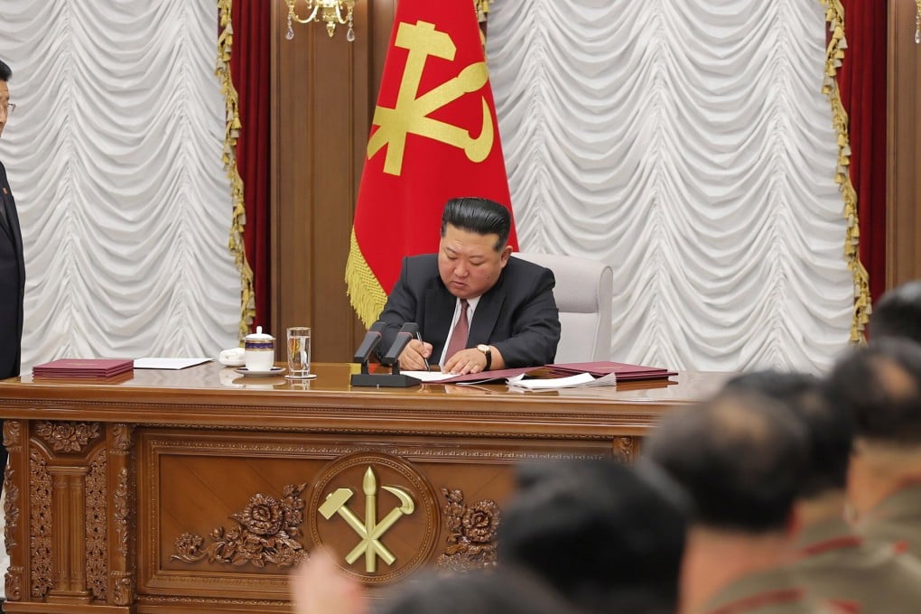 North Korean leader Kim Jong-un signs documents during a meeting of the ruling party’s Central Military Commission on Thursday. Photo: KCNA/EPA