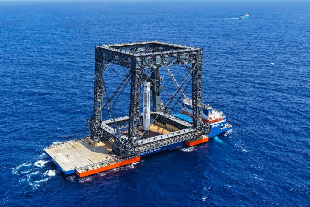 This drone photo taken last Friday shows the successful capture of the returned first stage of a Long March-10B carrier rocket on a seaborne platform. Photo: Xinhua