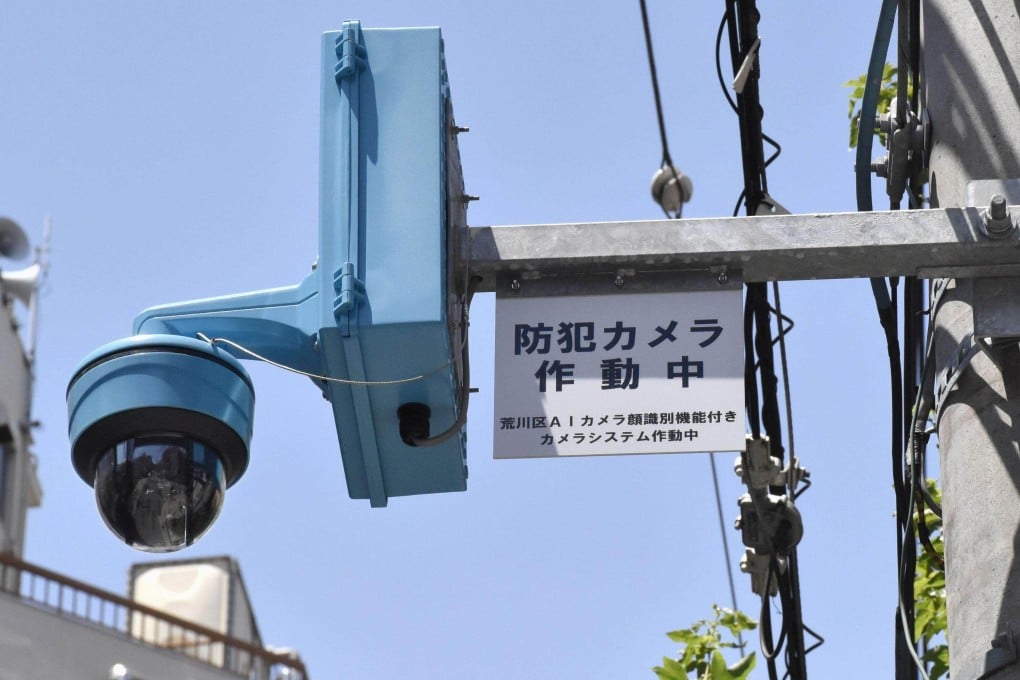 A security camera equipped with facial recognition AI stands in front of the JR Nippori Station in Tokyo’s Arakawa ward.  Photo: Kyodo