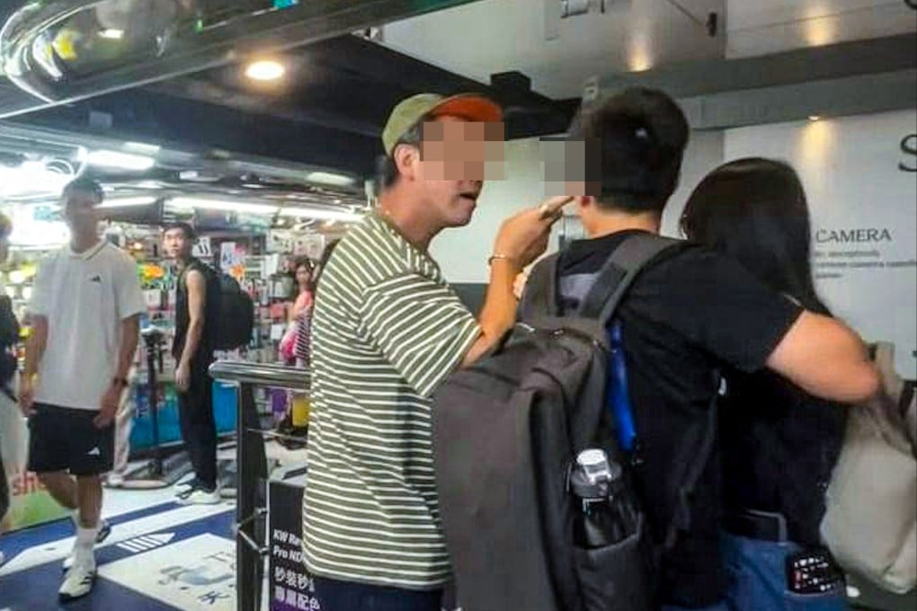 A screen grab of the suspect berating a younger couple at Sim City shopping centre in Mong Kok. Photo: Handout