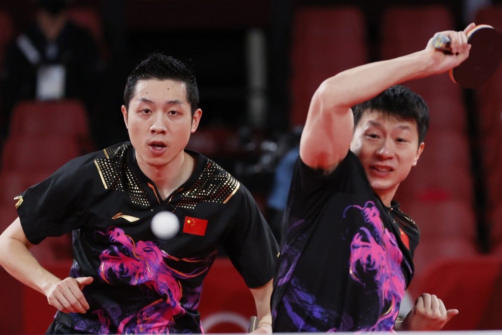 Xu Xin (left) and Ma Long on their way to helping China win the men’s team gold medal at the Tokyo Olympics in 2021. Photo: Getty Images