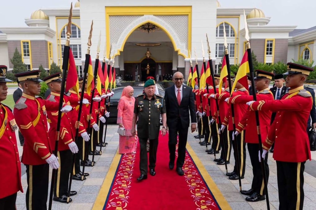 Singapore’s President Tharman Shanmugaratnam (right) and Malaysia’s King Sultan Ibrahim Iskandar inspect honour guards during a welcoming ceremony in Kuala Lumpur on Monday. Photo: Facebook/officialsultanibrahim