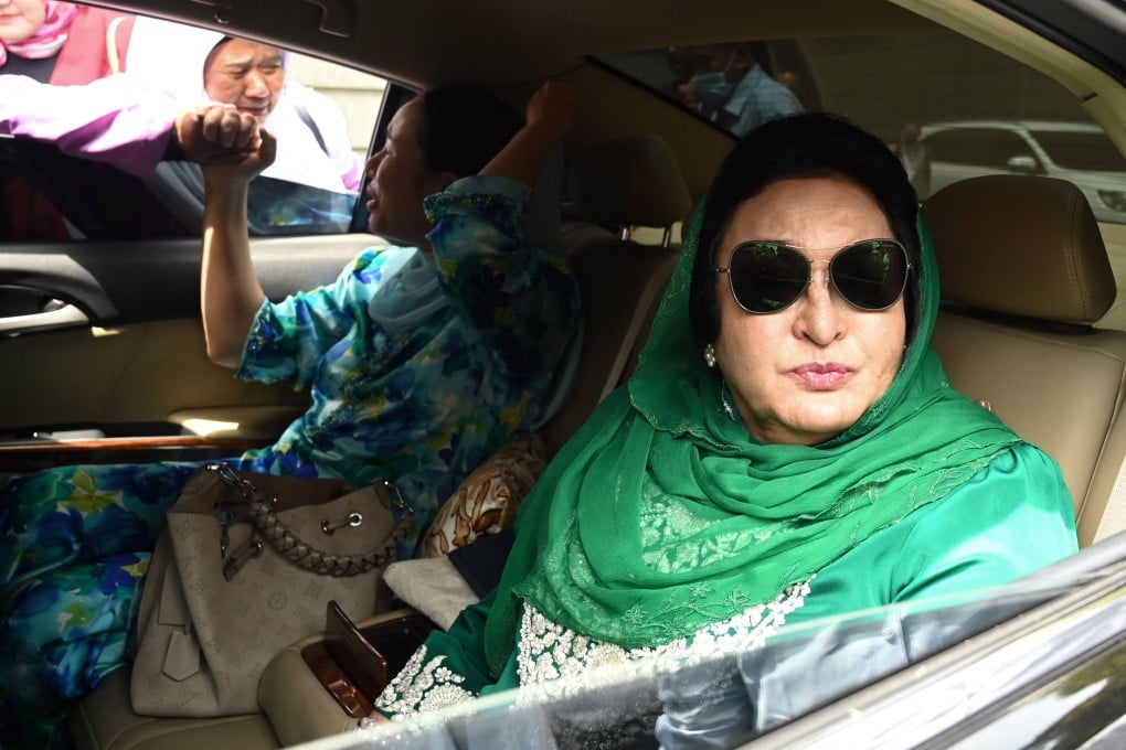 Rosmah Mansor (right) leaves a court complex in Putrajaya, Malaysia, in 2023. Photo: AFP