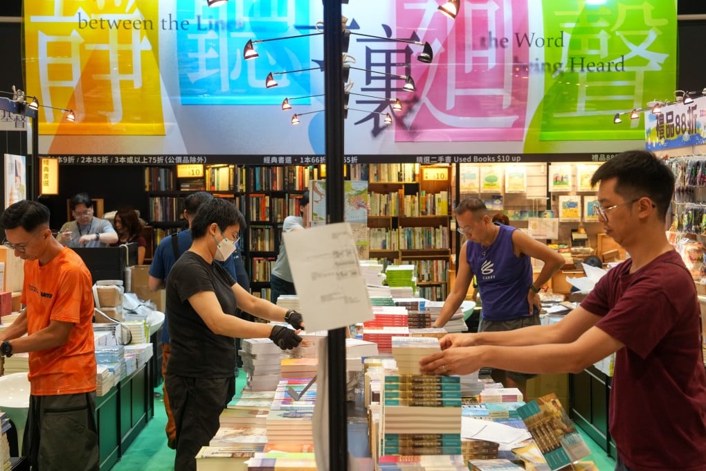Exhibitors prepare for the opening day of the Hong Kong Book Fair. Photo: Sam Tsang