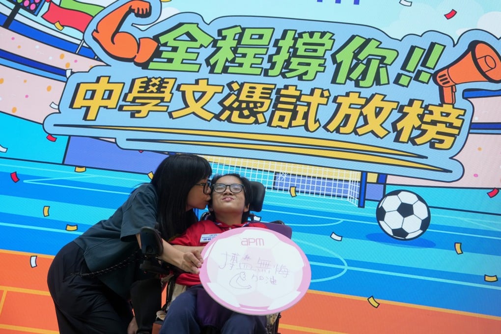 A mother and daughter attend an event organised by a Hong Kong mall to cheer on students receiving their Diploma of Secondary Education exam results this year, on July 14, a day before results release day. Photo: Sam Tsang