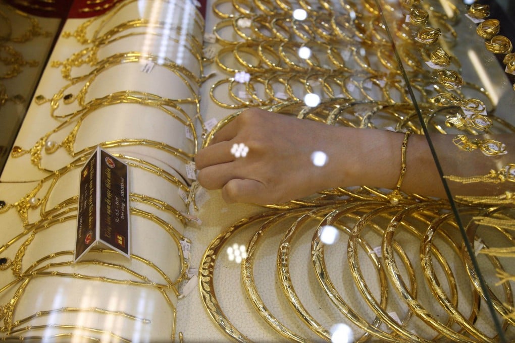 Gold products on display at a jewellery shop in Hanoi, Vietnam. Photo: Reuters