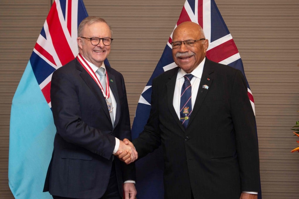 Australian Prime Minister Anthony Albanese shakes hands with Fiji’s Prime Minister Sitiveni Rabuka (right) before the Ocean of Peace Alliance signing on July 6. Photo: AFP