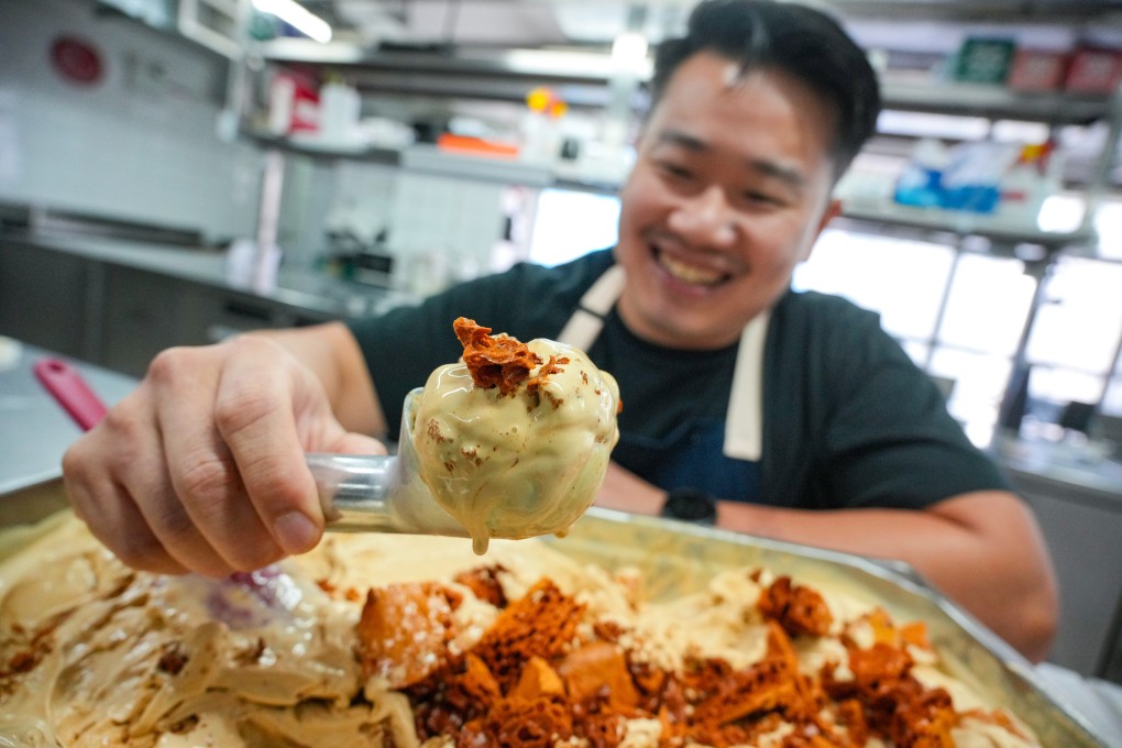Fun Kee Scoops founder Ernest Fung picks up a scoop of his premium, hand-crafted, French-custard-style ice cream at his studio in Wong Chuk Hang, Hong Kong. Photo: May Tse