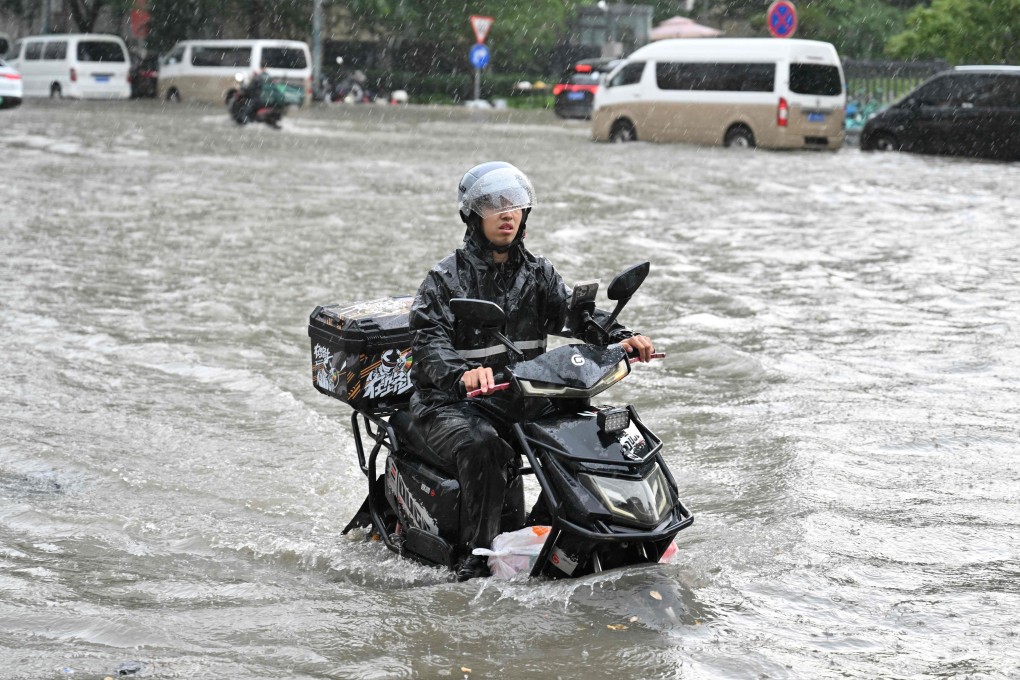 This month, large parts of China have been inundated by a pair of typhoons which have killed dozens and damaged crops and infrastructure. Photo: AFP