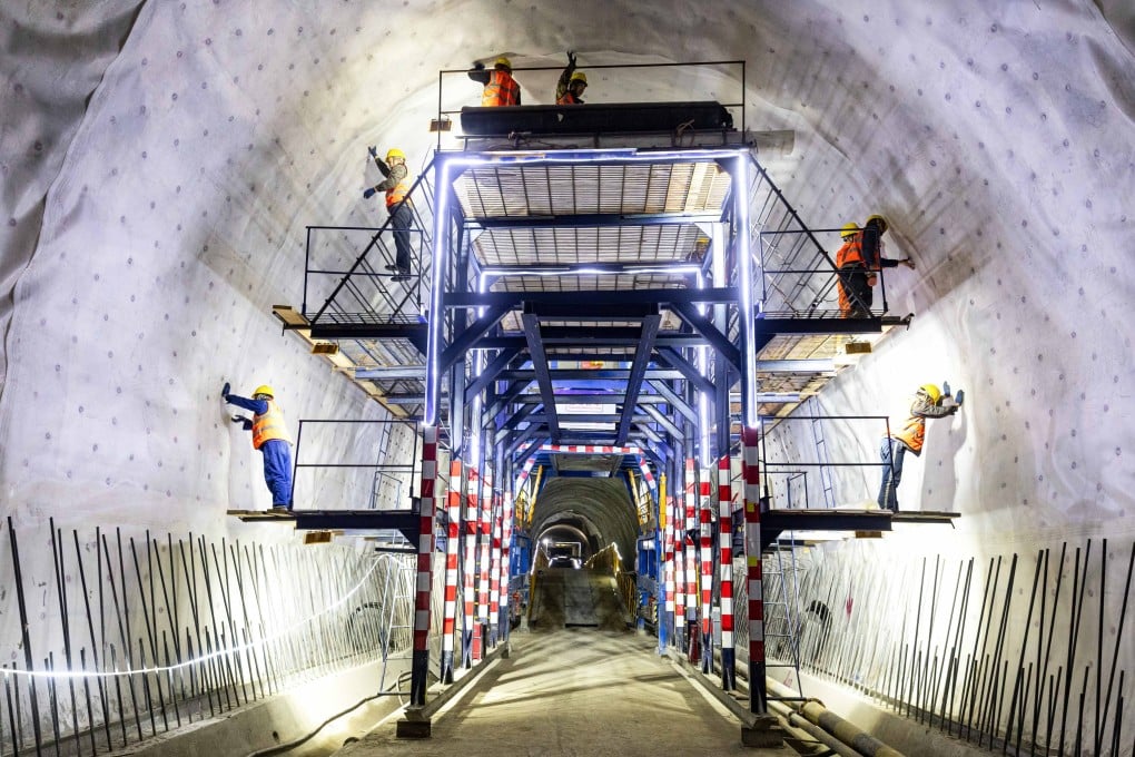 Chinese workers are seen in a tunnel in Kyrgyzstan, on February 13, part of the 523km China-Kyrgyzstan-Uzbekistan railway currently under construction. Photo: Xinhua