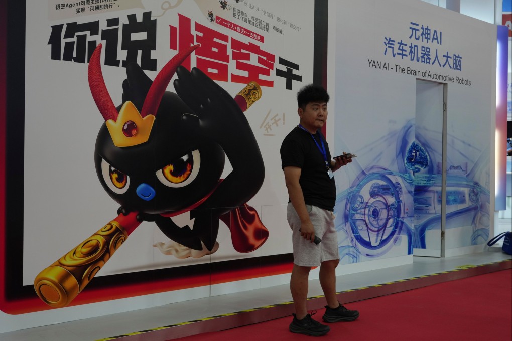 A man stands near a poster promoting Alibaba’s AI agent Wukong, at the China International Supply Chain Expo in Beijing on June 22. Photo: AP
