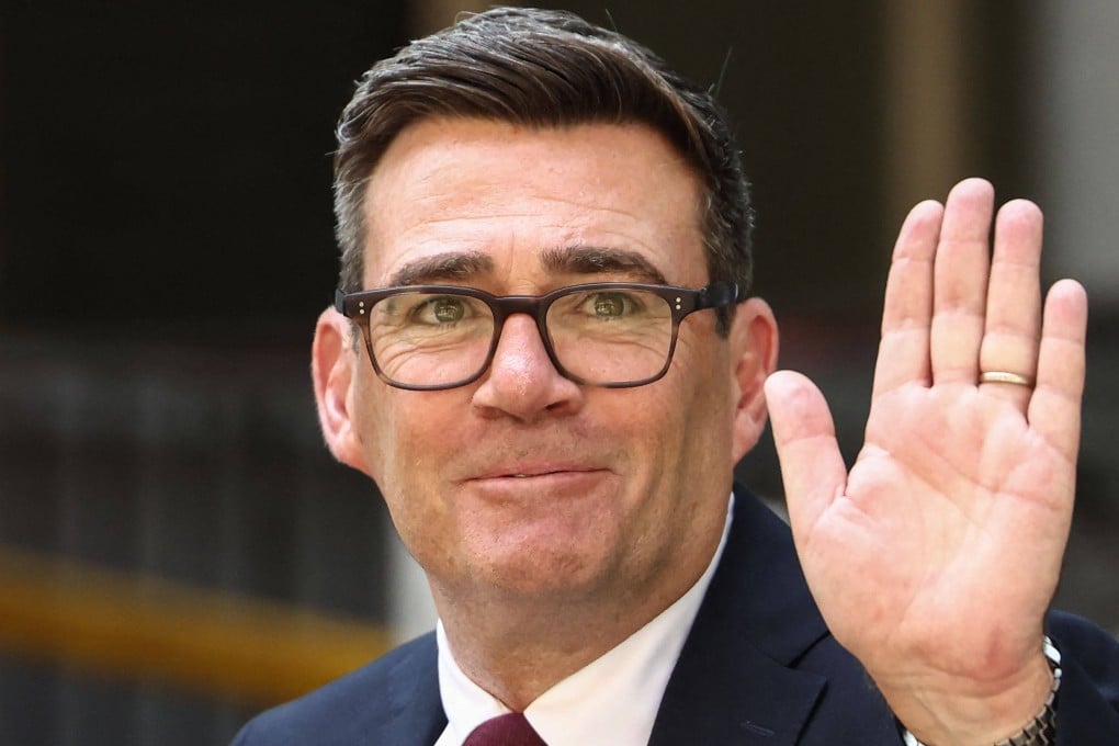 Andy Burnham waves as he leaves Labours special conference, where he was confirmed as the party’s new leader and the country’s next prime minister, on Friday. Photo: AFP