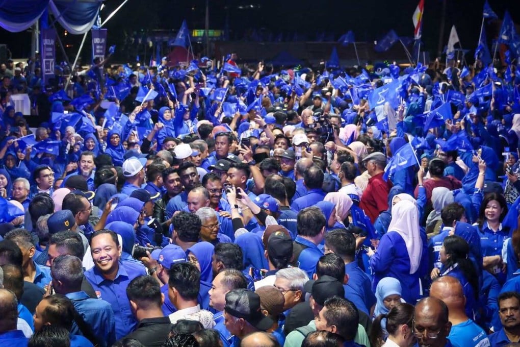 Barisan Nasional supporters attend the announcement of the party’s slate for the Negeri Sembilan election. Photo: Facebook/barisanasional