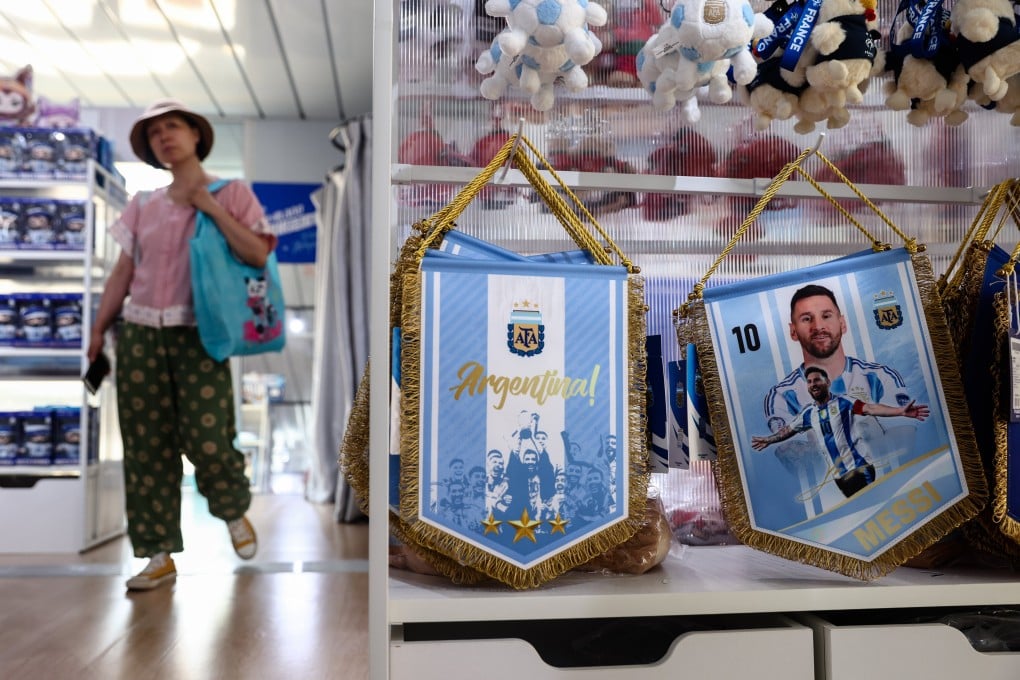 A customer browses a FIFA World Cup 2026 store in Beijing displaying merchandise featuring Argentine soccer player Lionel Messi. Photo: EPA