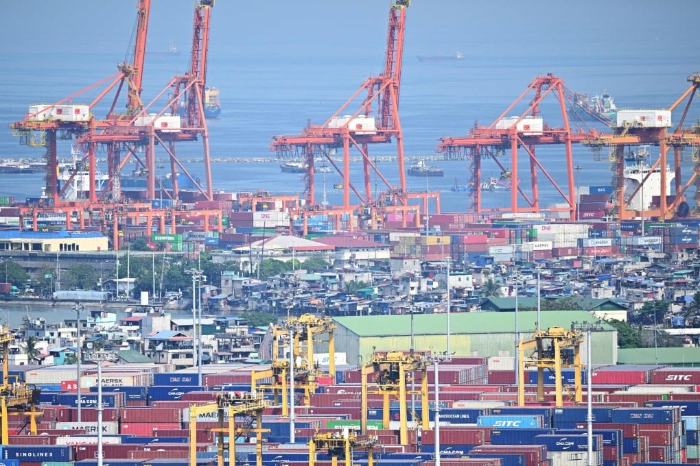 Containers and cranes at the international port of Manila last year. Risk analysts have praised the Philippines for its market openness, regulatory strength and labour rights. Photo: AFP