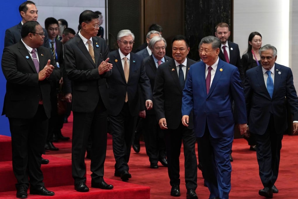 Chinese President Xi Jinping before a group photo with other attendees prior to the opening ceremony of the World AI Conference in Shanghai on Friday. Photo: AP