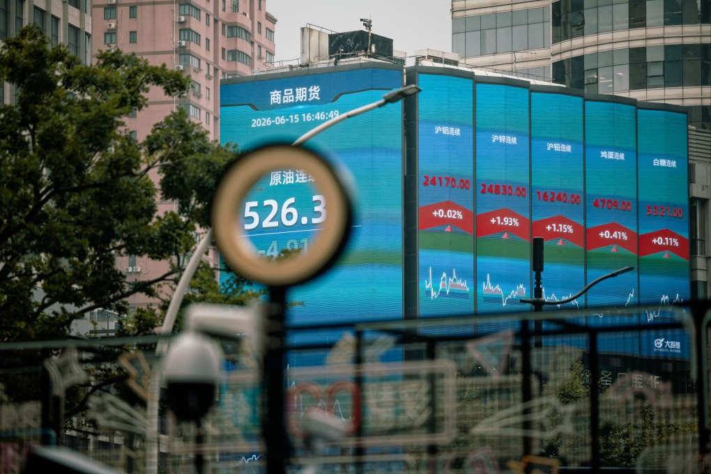 A large screen shows stock exchange and economy data in Shanghai. Photo: EPA