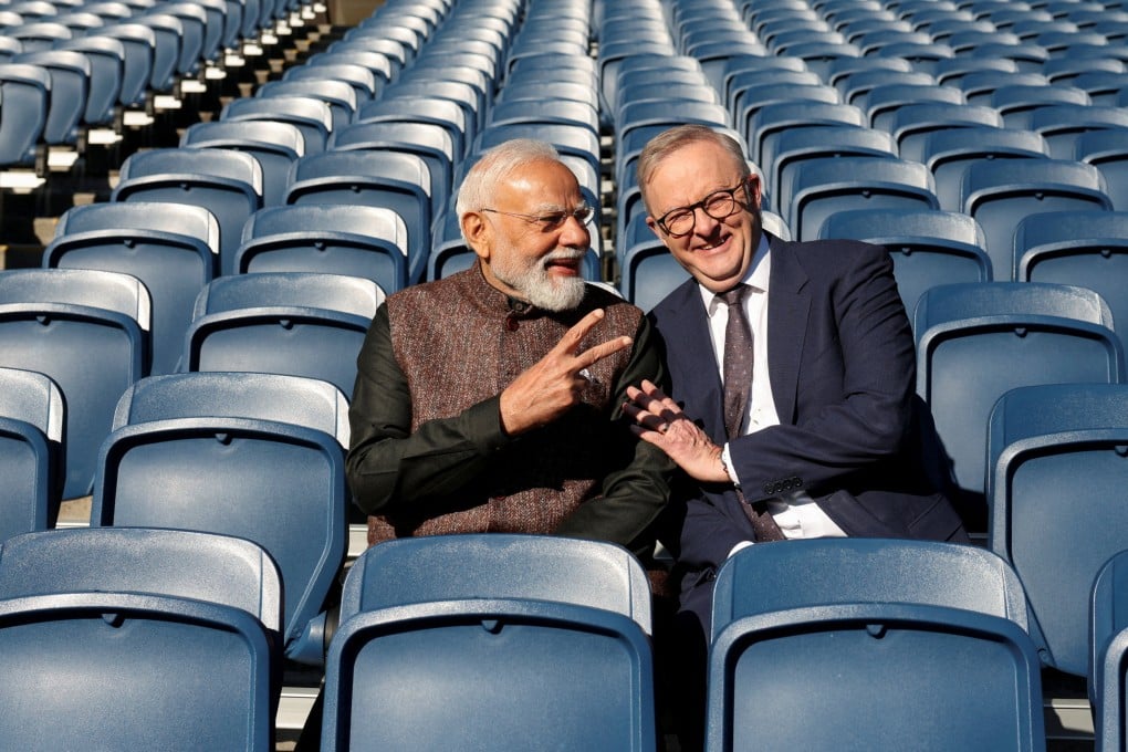 Indian Prime Minister Narendra Modi and his Australian counterpart Anthony Albanese pose for a picture in the stands at the Melbourne Cricket Ground on July 10. Photo: Reuters
