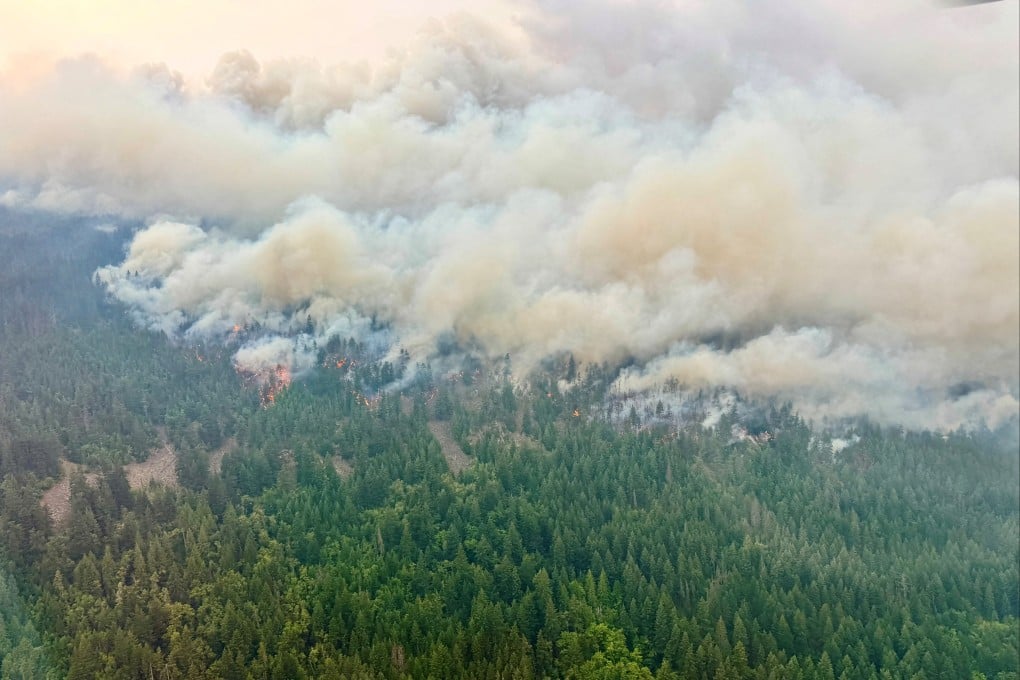 Smoke rises from the south flank of the Brunswick Creek wildfire near North Bend, British Columbia, Canada, on Thursday. Photo: Reuters