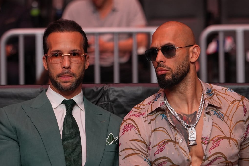 Influencer Andrew Tate (right) and his brother Tristan arrive an event in Miami in April. Photo: AP
