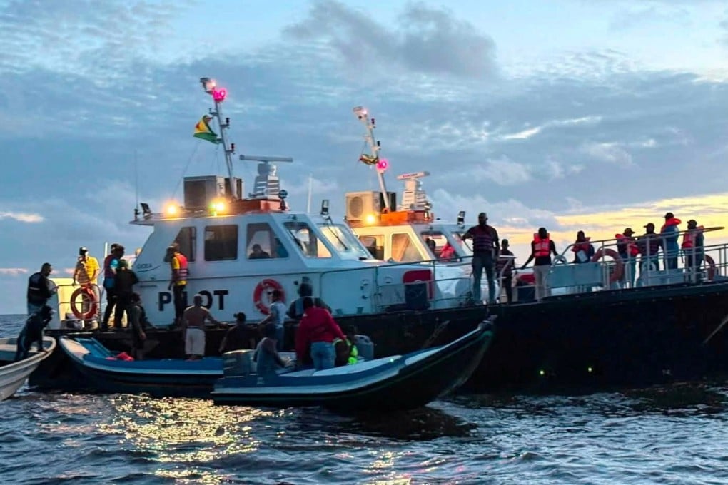 Rescuers look for passengers on Sunday after the MV Barima capsizes off the coast of Guyana. Photo: Handout via Reuters